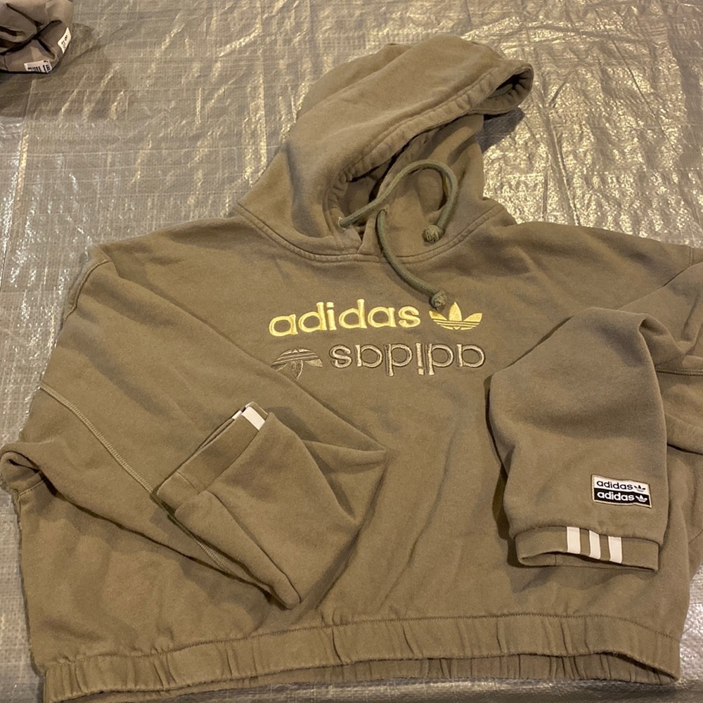 Woman’s olive hoodie